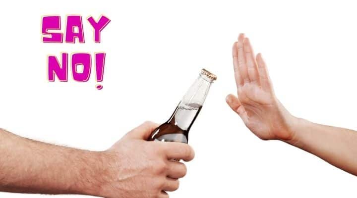 hand saying no to alcohol