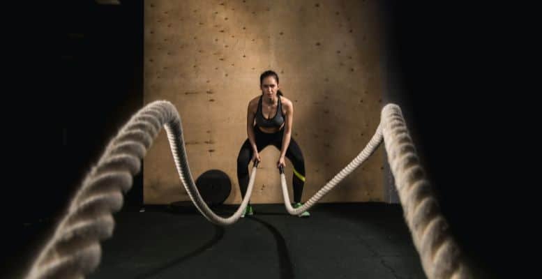 women working out with ropes