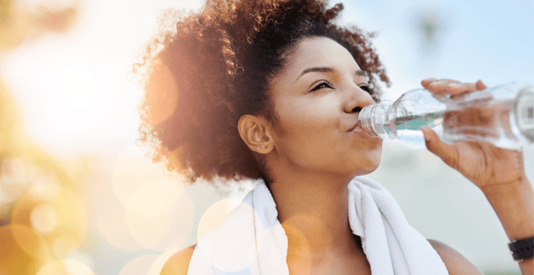 women hydrating with water